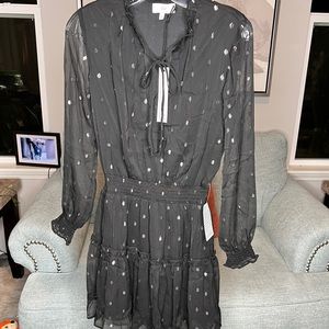 Ruffle dress floral print by Emma size S , black Clip dot